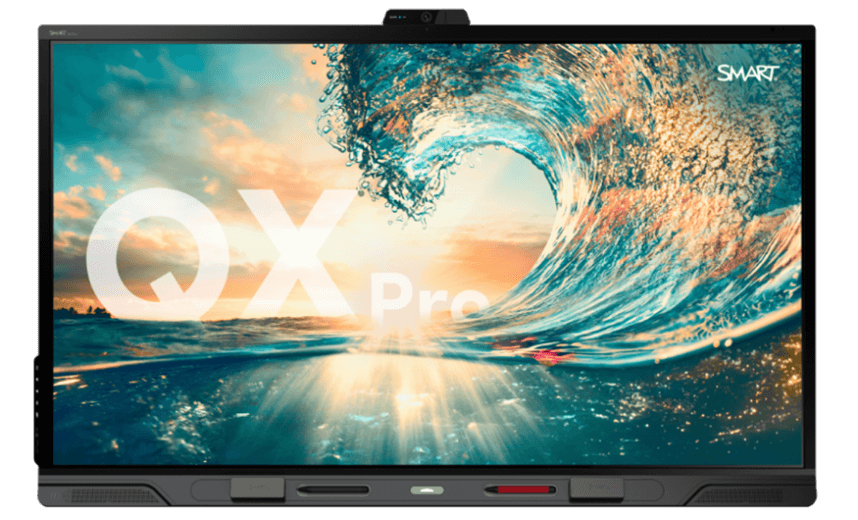 QX Pro SMART Board for business meetings, featuring a vibrant image of a cresting ocean wave under a sunset.